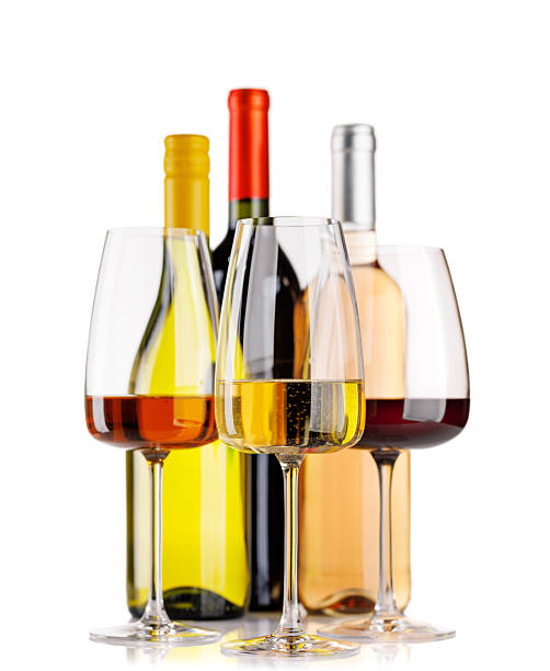 istock Different wine bottles and glasses on white background 2246785090
