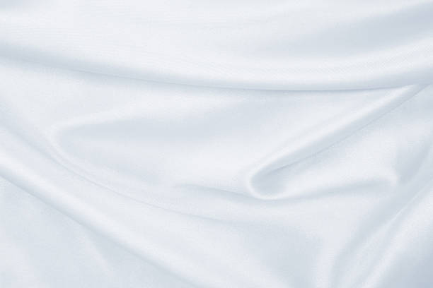 istock Smooth elegant grey silk or satin luxury cloth as wedding background. Luxurious background design 2246789754