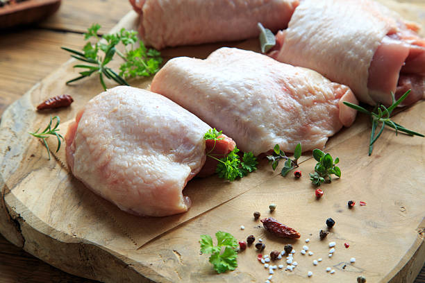 istock fresh pollofinos on wooden board 2246791690