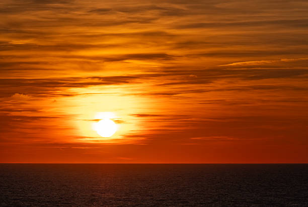 Sunset and dramatic cloudscape over the Mediterranean Sea.