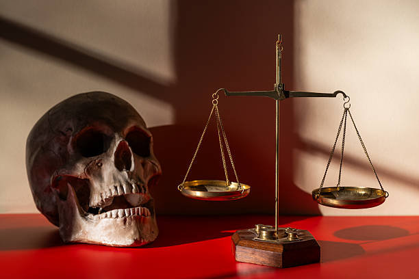 Scales of Justice and a Skull in a Light and Shadow Drawing