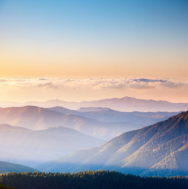 istock Vivid mountain range with visible silhouettes. Location place Carpathian mountains, Ukraine. 2246798502