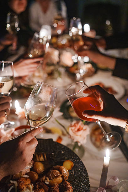 istock Celebration with toasting glasses at a festive dinner 2246806655
