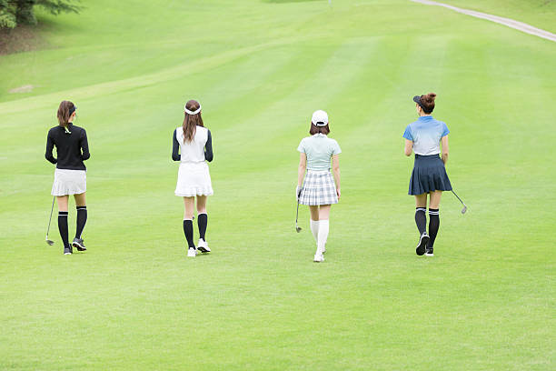Asian woman enjoying golf