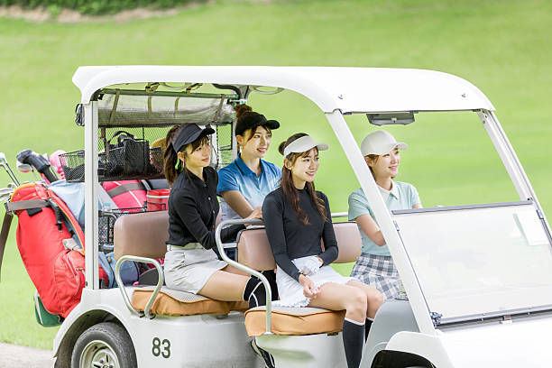 Asian woman enjoying golf