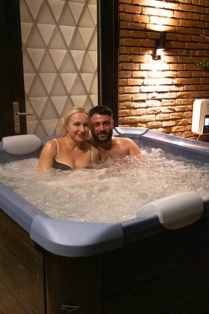 istock Couple relaxing in hot tub. night 2246810181