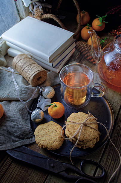 Homemade Christmas Tea Scene with Books and Rustic Holiday Treats