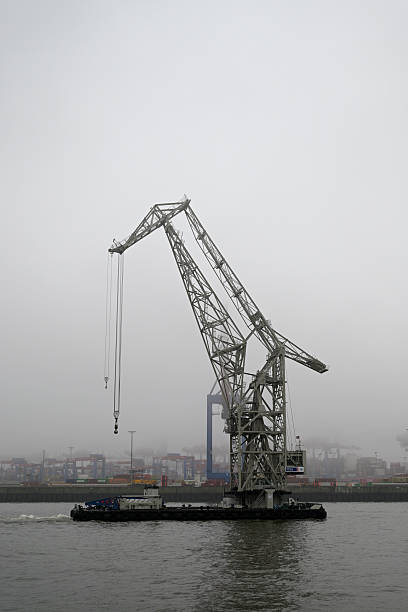 Hamburg, Germany - November 9th 2025 - Fog over the Hamburg Harbor. Ride with the Harbor Ferry along the Elbe River.