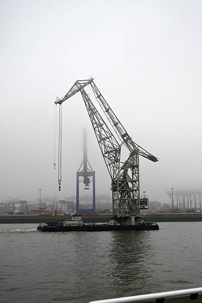 Hamburg, Germany - November 9th 2025 - Fog over the Hamburg Harbor. Ride with the Harbor Ferry along the Elbe River.
