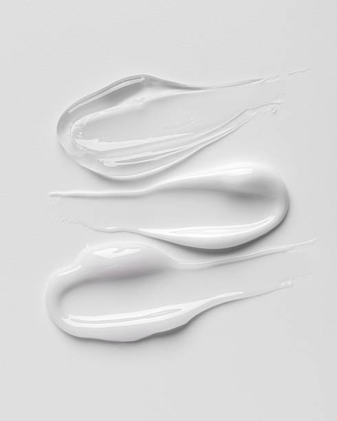 istock White cosmetic cream texture on clean background 2246812839