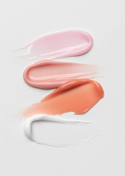 istock Beige and pink glossy cosmetic smears texture 2246812968