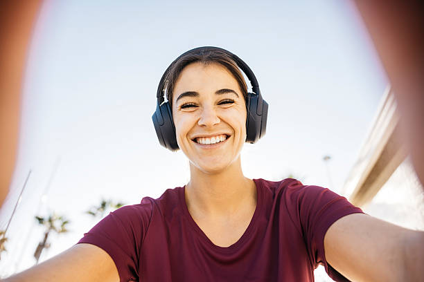 istock Happy woman taking a selfie outdoors after workout 2246814988