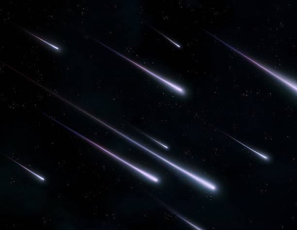 istock Shooting stars illuminated the sky. A meteor storm flared up in the night. 2246815108