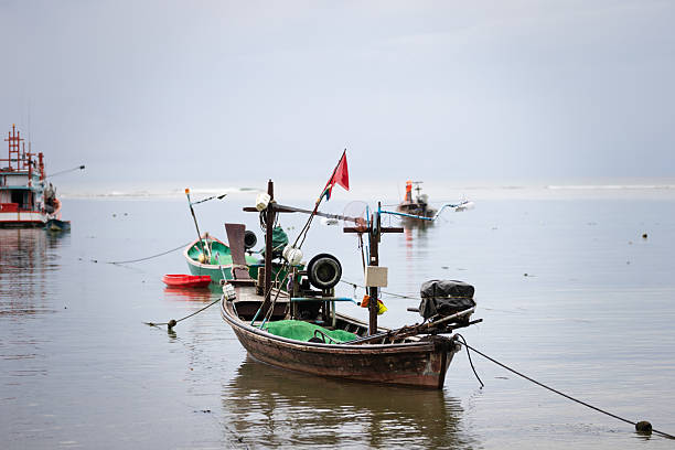 Classic Thai style boat stands on the beach.Phuket Island - Thailand.