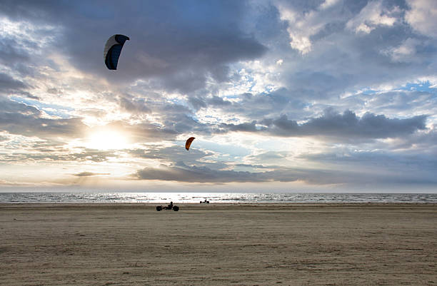 istock Kite Buggy Action on Vast Fano Beach under Dramatic Sky 2246839527