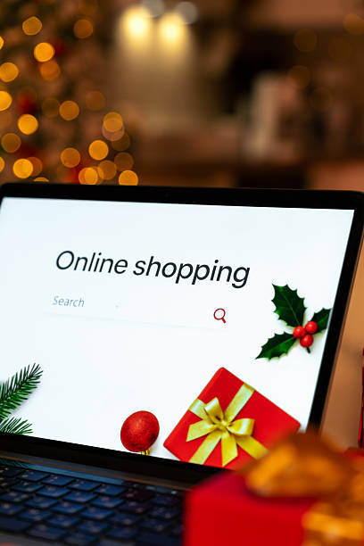 istock Christmas online shopping on laptop from home. 2246842977