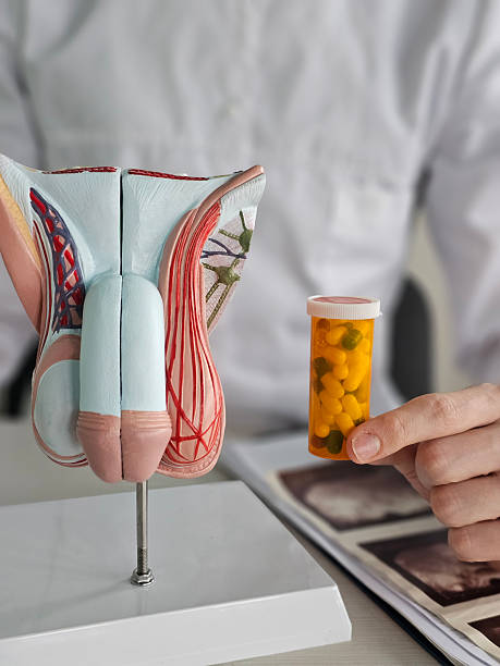 istock Doctor makes diagnosis and gives advice on treating male erectile dysfunction. Man health problems and pills concept 2246847979