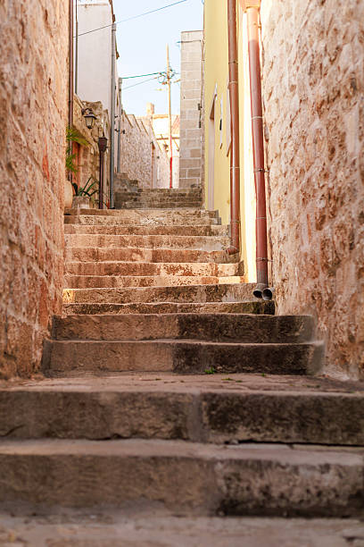 istock Stone steps in narrow alley 2246848424