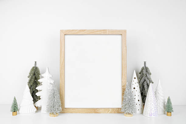 istock Christmas mock up with wooden frame and green and white Christmas tree decor 2246852821