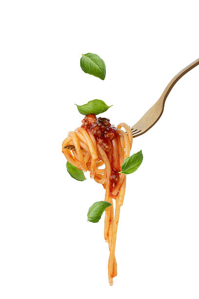 istock Fork with pasta, basil and sauce on white isolated background falling, levitation 2246852928
