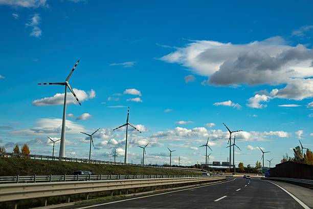 istock wind turbines beside a highway 2246855682