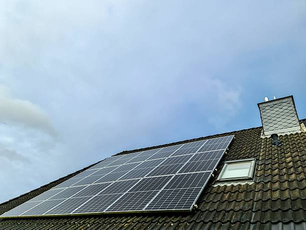 istock Solar panels on house roof generating clean energy 2246855781