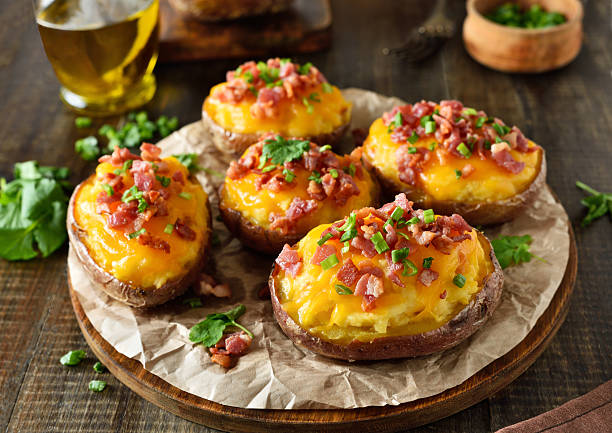 istock Baked stuffed potatoes with bacon, green onion and cheddar cheese 2246856921