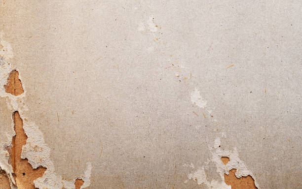 istock Textured cardboard background with subtle color gradient and scratches. 2246857192