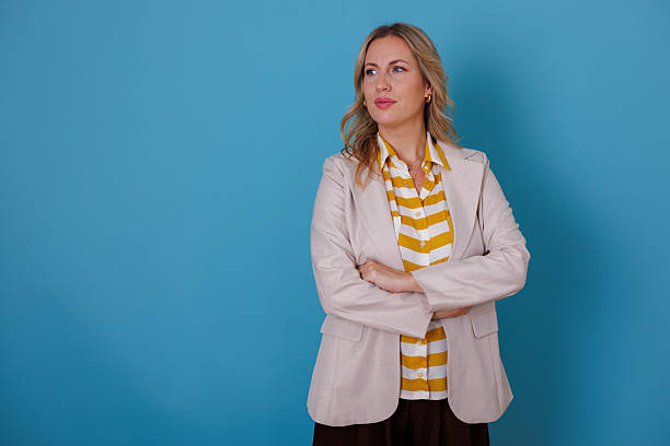 istock Pensive businesswoman with a serious expression, brainstorming and considering new ideas or solutions 2246861349