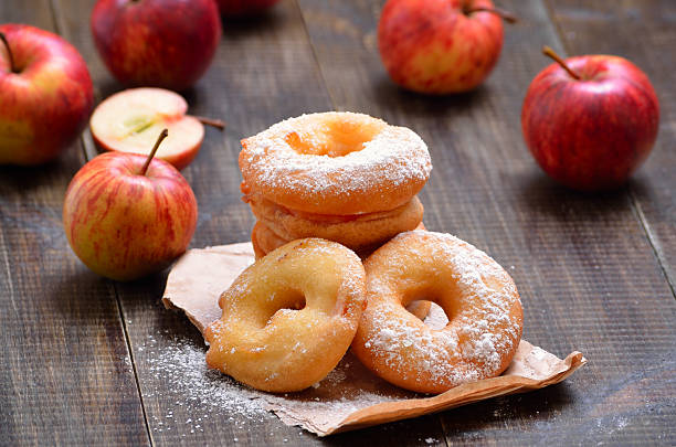 istock Homemade donuts with apples and powdered sugar 2246861574