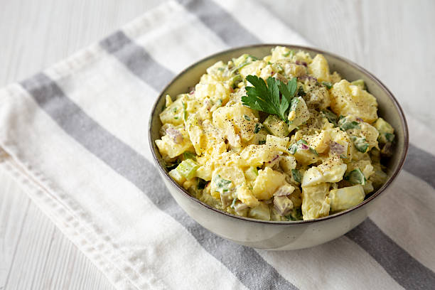istock Homemade Potato Egg Salad with Pickles in a Bowl, side view. Space for text. 2246862617