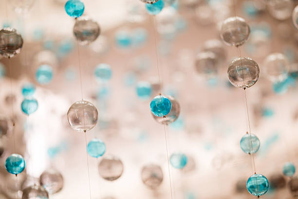 istock Delicate Glass Orbs Hanging in Air 2246862852