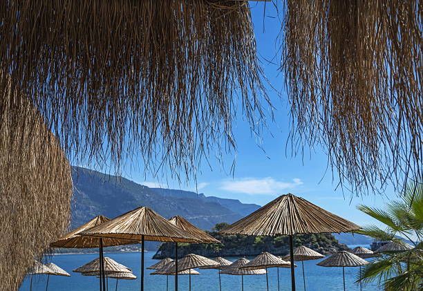 Straw umbrellas on the Blue Lagoon beach in Oludeniz.