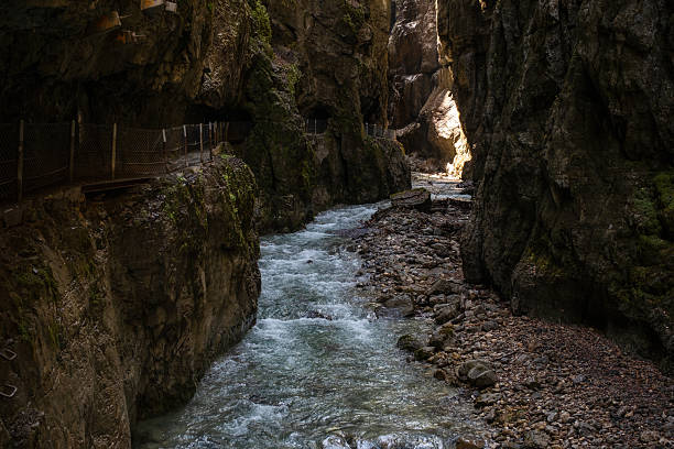 istock River Flowing Between Tall Rocks in a Scenic Natural Landscape 2246867827