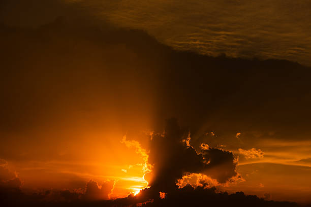 Stormy night cloud. Sunset sky dramatic sunset clouds and sunset sunrays. Beautiful colorful dramatic sky with clouds at sunset or sunrise. Sun rays. Skyscape nature composition. Natural sky background