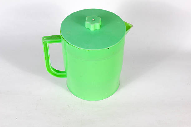 istock green plastic teapot mineral water drink container isolated on white background 2246874466