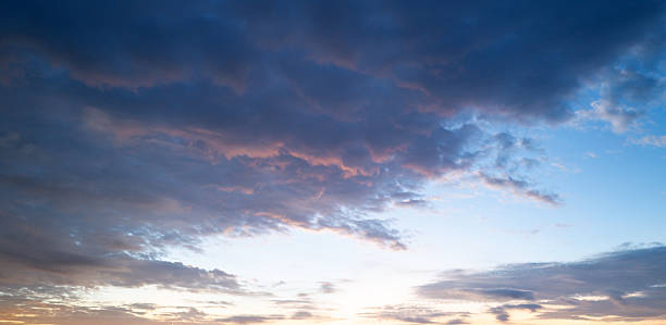 istock Clouds background. Dramatic Clouds Sunset Background. Sky with clouds in Sunrise. Sunrise with clouds in various shapes background. Calm Cloud. 2246875886