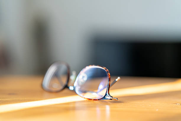 istock Eyeglasses on a desk suggesting a break from remote work 2246877380