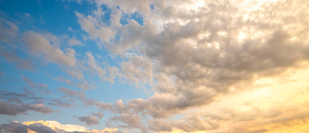 istock Sunset background. Dramatic sunset. Sky with clouds in sunset sky light background. Sunrise with clouds dawn sky. Calm sunset sky and sun through clouds over. 2246890477