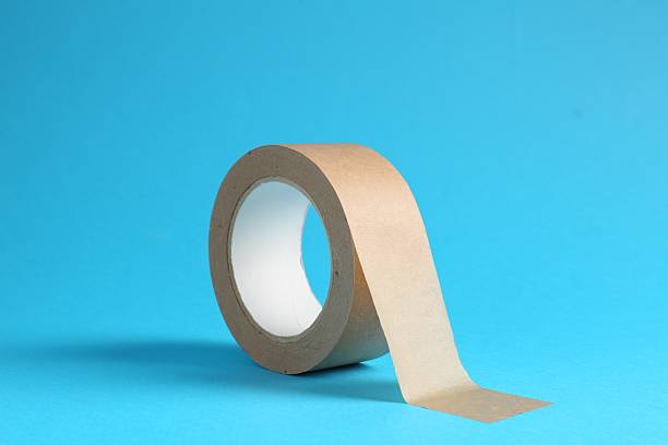 istock Roll of masking tape on light blue background 2246891910