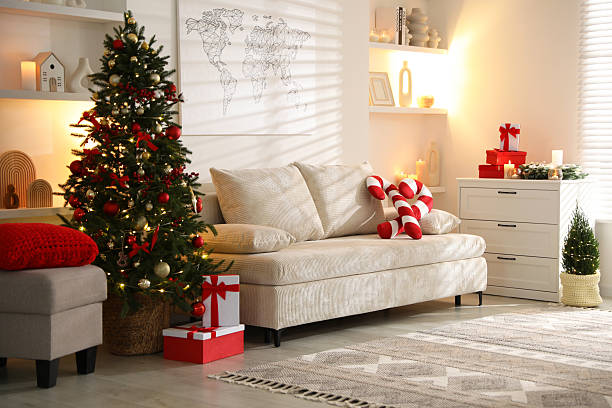 istock Beautiful Christmas tree and other decor in spacious room. Festive interior design 2246897004