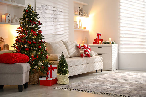 istock Beautiful Christmas tree and other decor in spacious room. Festive interior design 2246897022