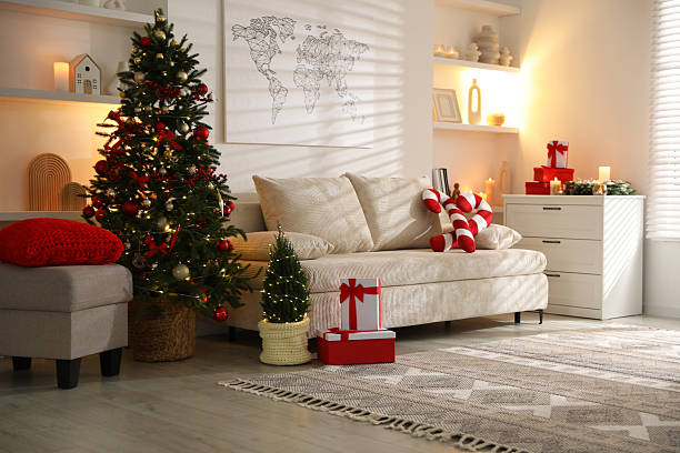 istock Beautiful Christmas tree and other decor in spacious room. Festive interior design 2246897026