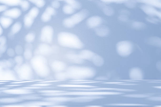 istock Studio style background wall decoration presentation uses white and blue tones. with shadows cast from a nearby window, concept creating a decorative 2246897207