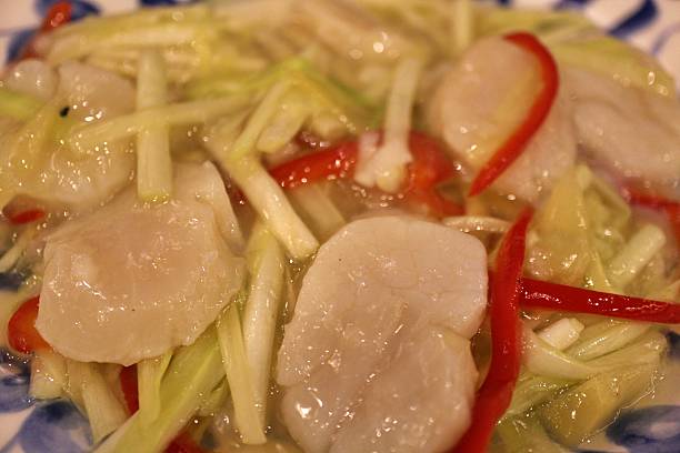 Chinese cuisine: stir-fried scallops and yellow chives