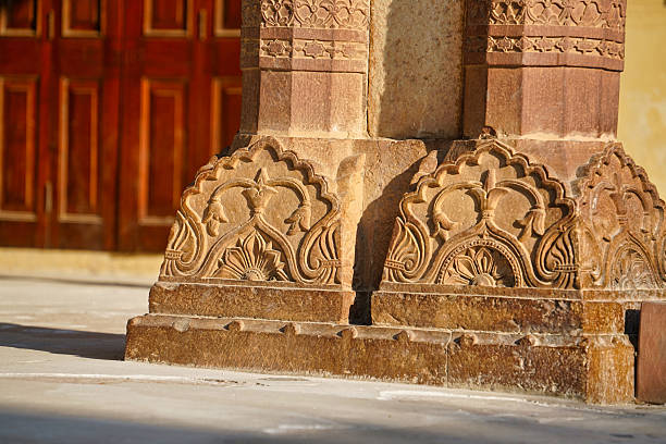 The Purana Quila, or Old Fort, stands as a testament to Delhi's rich and tumultuous history. Nestled within its fortified walls lies a treasure trove of architectural marvels, each telling a unique tale of the city's past. Among these architectural gems is a magnificent gateway, its intricate details and towering structure captivating the imagination of visitors from around the world.This gateway, though often overshadowed by the more famous Red Fort, is a masterpiece of Mughal architecture. Its design is a harmonious blend of Persian and Indian styles, reflecting the cosmopolitan nature of the Mughal empire. The towering dome, a symbol of Mughal power and authority, rises majestically above the surrounding structures. Its intricate carvings, adorned with floral motifs and geometric patterns, showcase the exquisite craftsmanship of the artisans who created it.The gateway's exterior is a testament to the passage of time. The weathered stone, marked by the elements, tells a story of centuries of resilience and endurance. The cracks and fissures that have developed over the years add to its character, lending it a sense of authenticity and history. Yet, despite the ravages of time, the gateway's beauty remains undiminished.