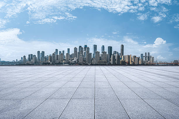 istock Empty square floor with the modern urban architectural landscape and city skyline. 2246916455