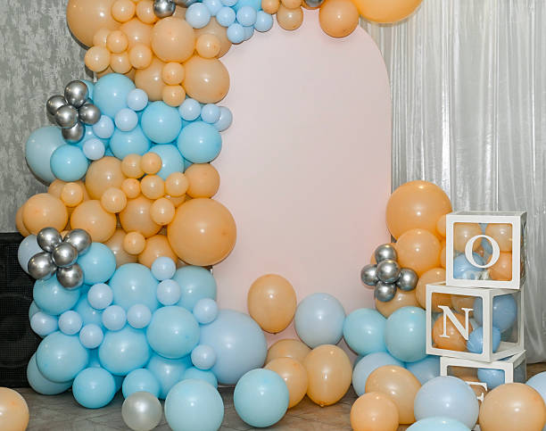 istock large and colorful balloon arrangement in orange, blue, 2246916549
