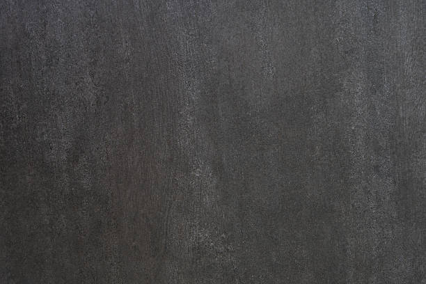 istock black stone wall texture and background, close up 2246917850