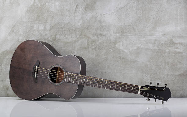 istock Musical instrument - folk acoustic guitar with a reflection 2246919597